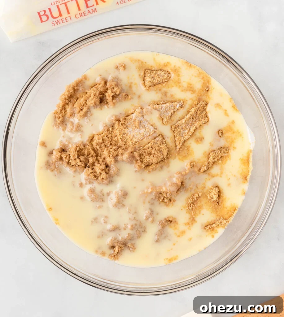 crushed graham crackers, melted butter, and sugar in a mixing bowl