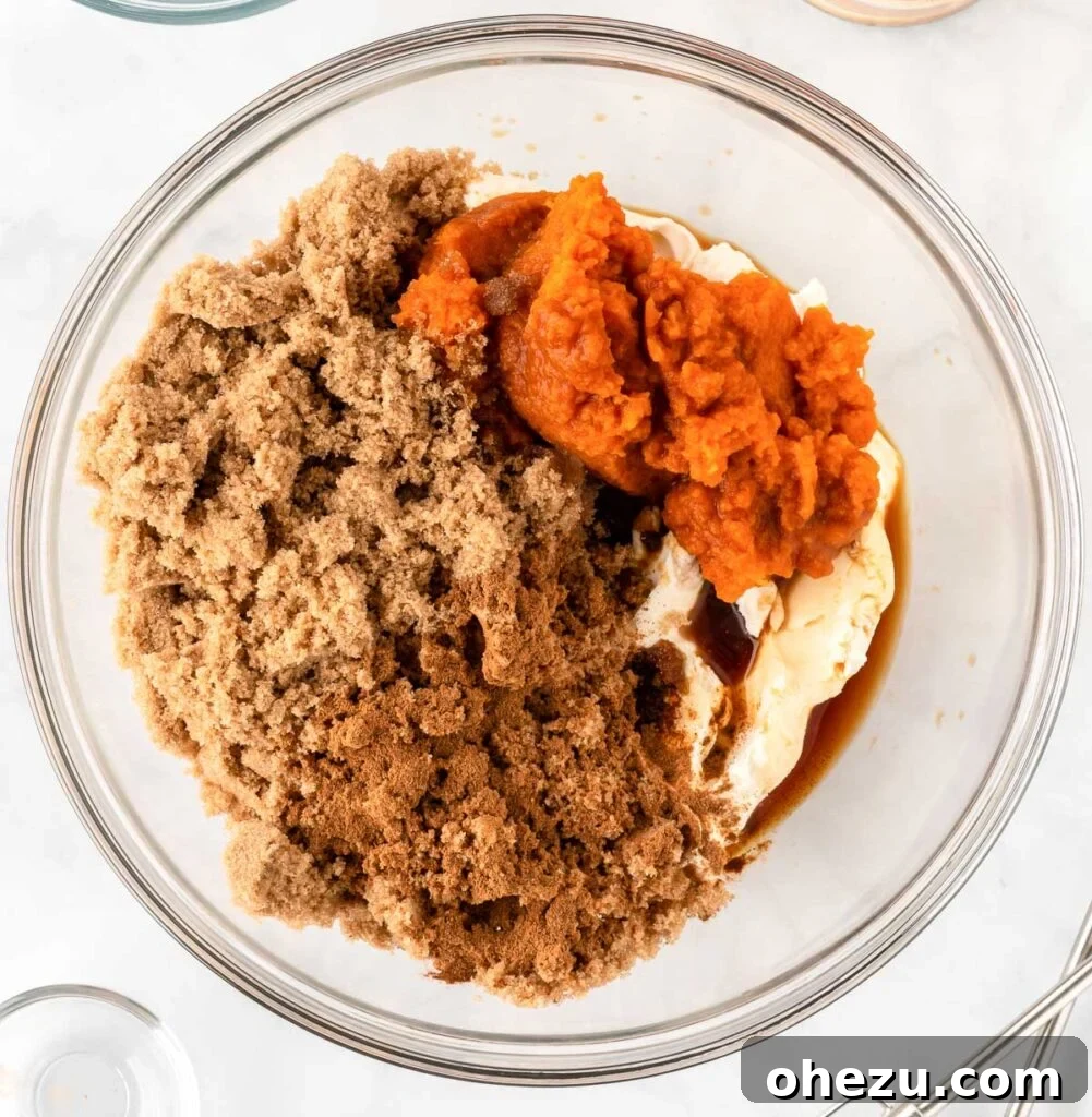 creamy pumpkin and cream cheese mixture in a bowl