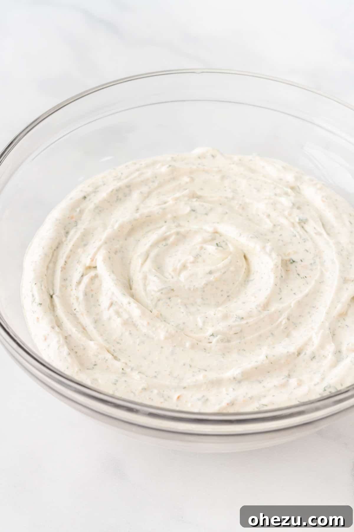 Garden Fresh Dip 7 A close-up shot of the finished homemade veggie dip, smooth and creamy, presented in a small white bowl, ready for serving.