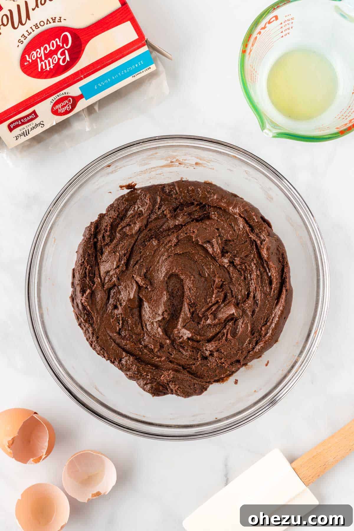 Thick chocolate cake mix crinkle cookie dough in a bowl