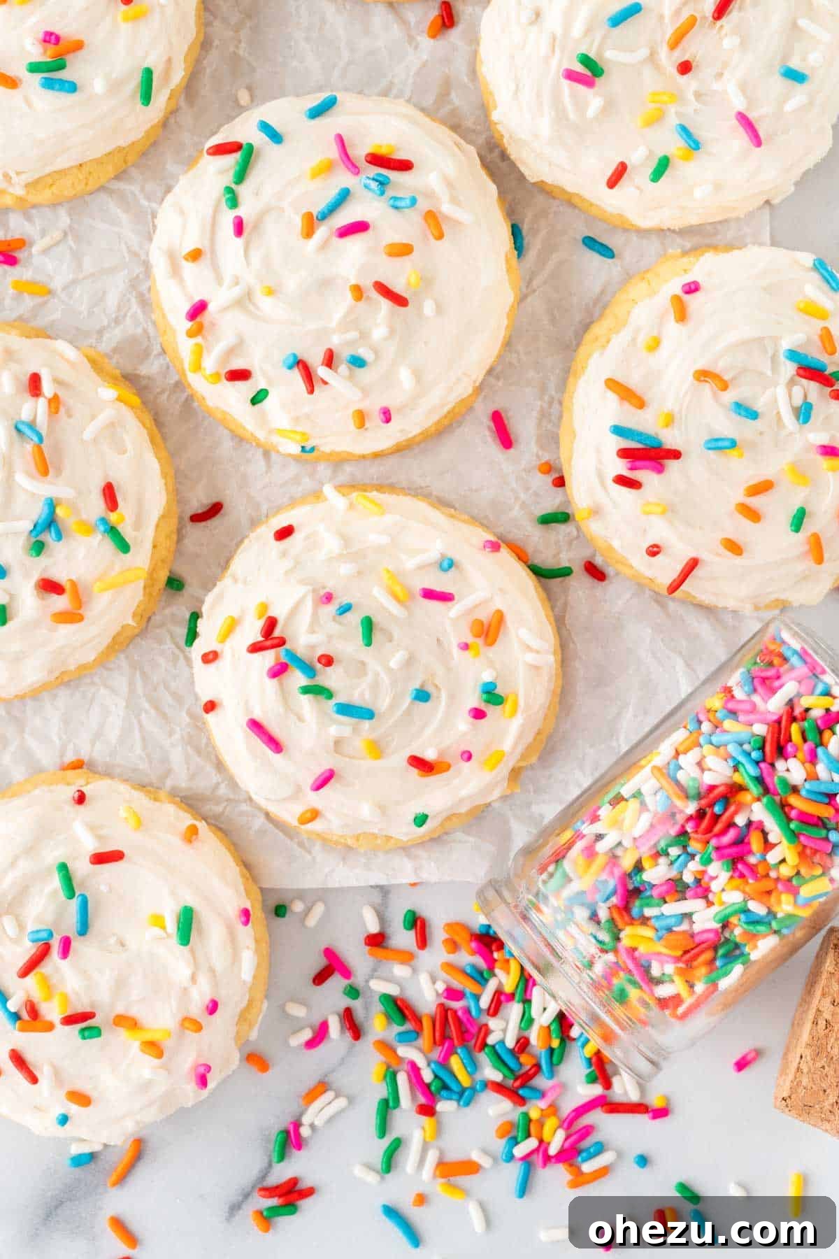 cake mix sugar cookies topped with frosting and sprinkles in different styles