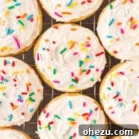 sugar cookies with frosting and sprinkles
