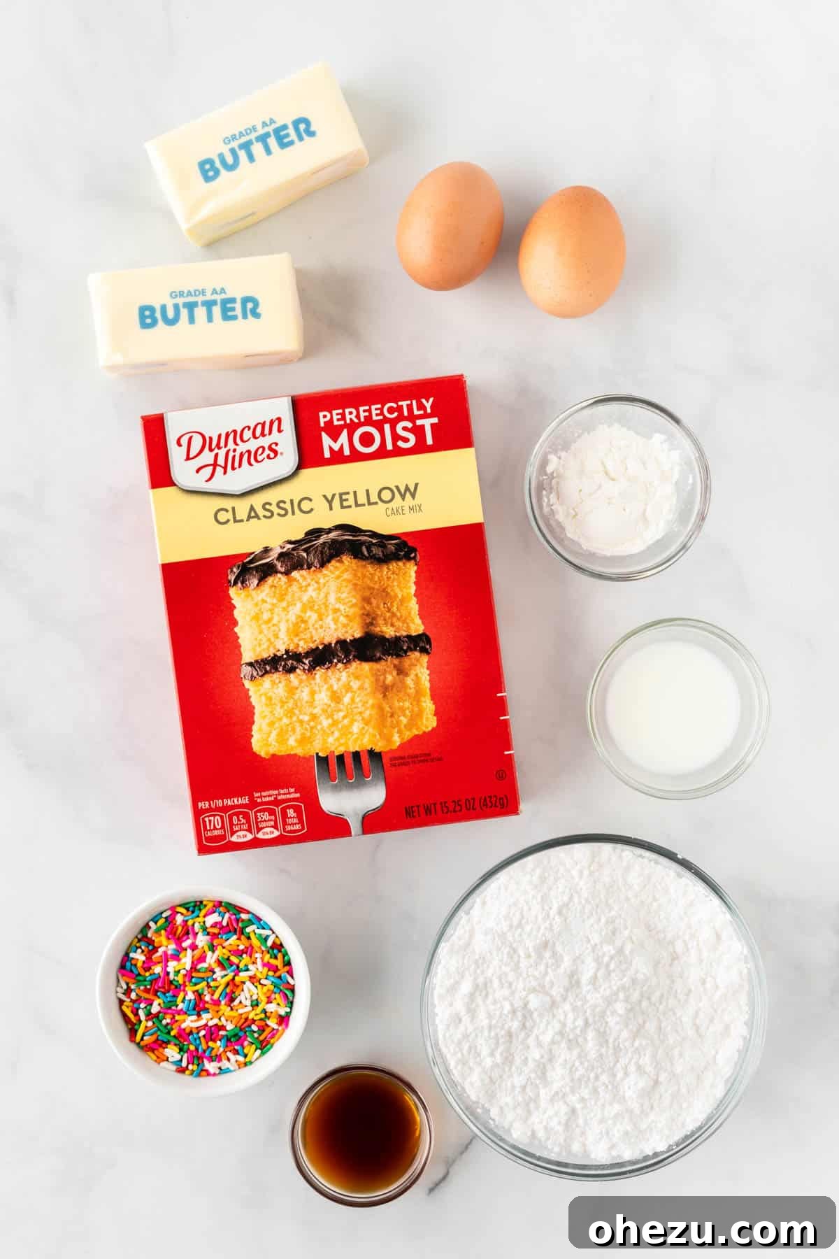 ingredients needed to make cake mix sugar cookies laid out on a surface