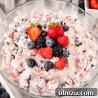 cheesecake salad topped with fresh berries
