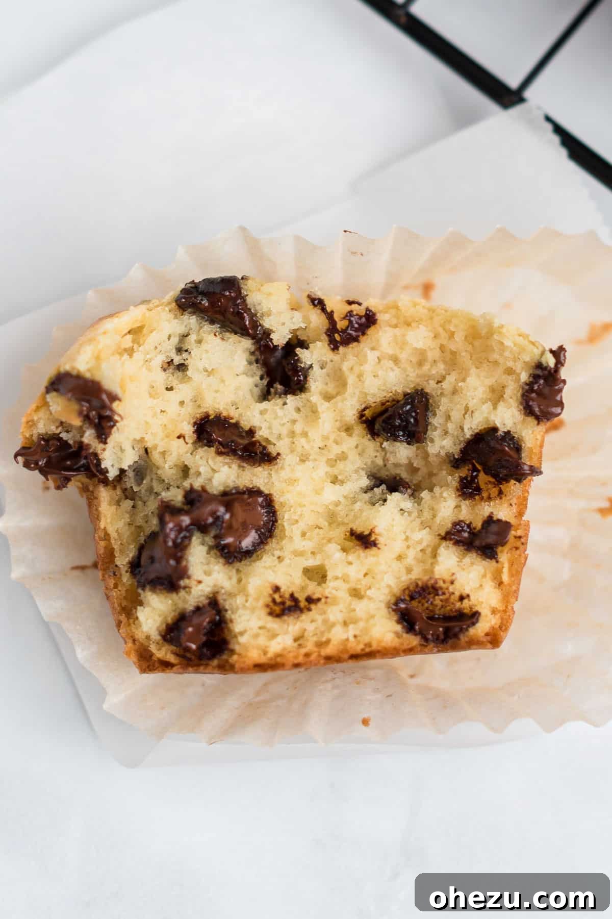 Irresistible Bakery Chocolate Chip Muffins 3 chocolate chip muffin with golden brown top