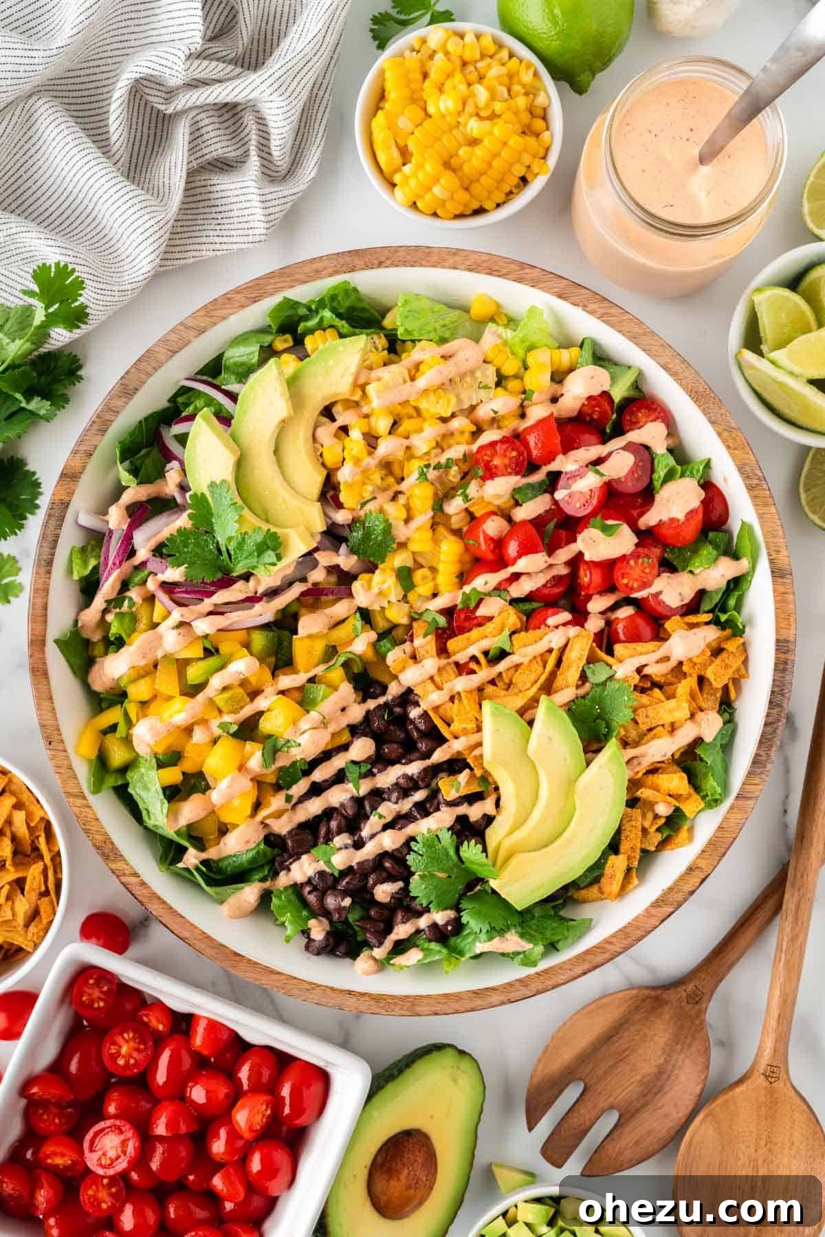 Fiesta Fresh Salad 2 southwest salad drizzled with chipotle ranch dressing, showcasing vibrant colors and fresh ingredients