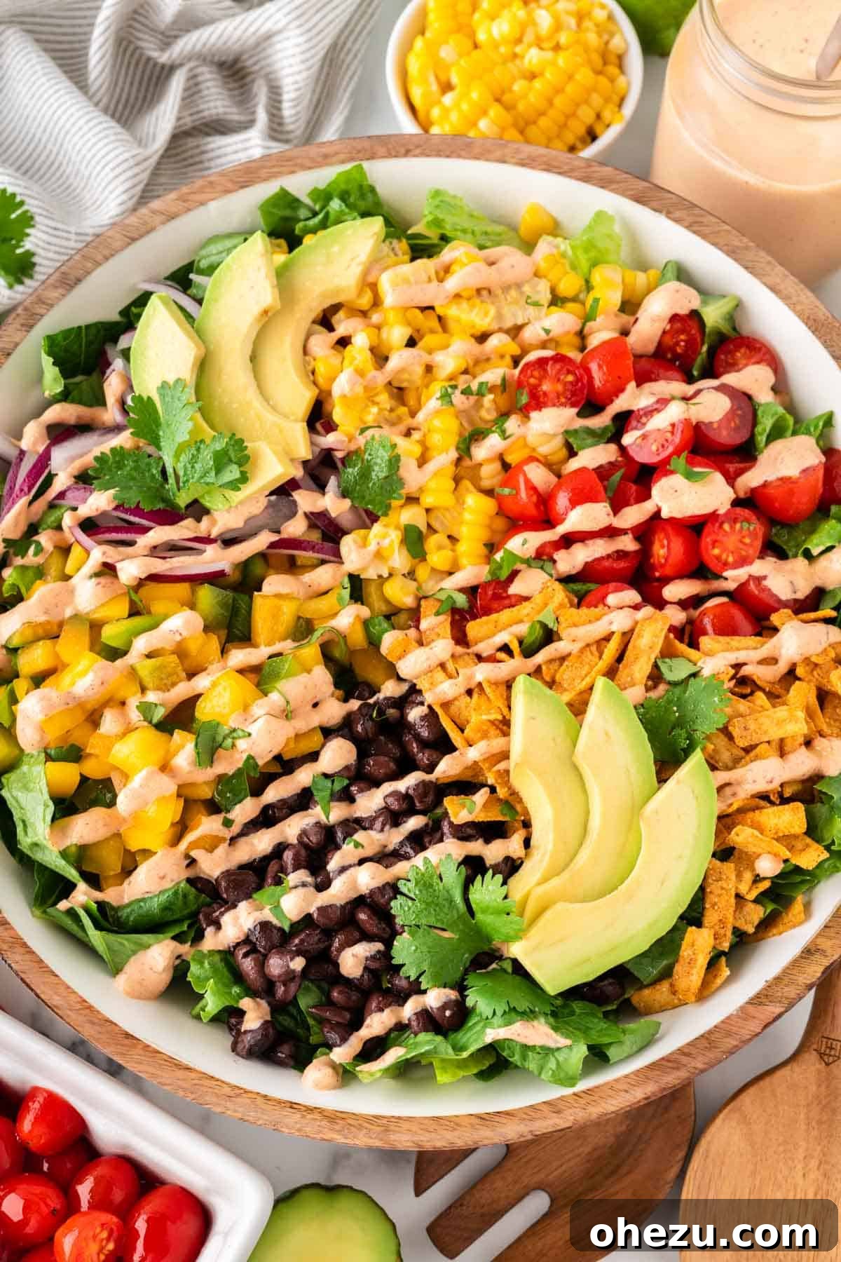 Fiesta Fresh Salad 11 southwest salad with chipotle ranch dressing, presenting a beautifully arranged and garnished dish
