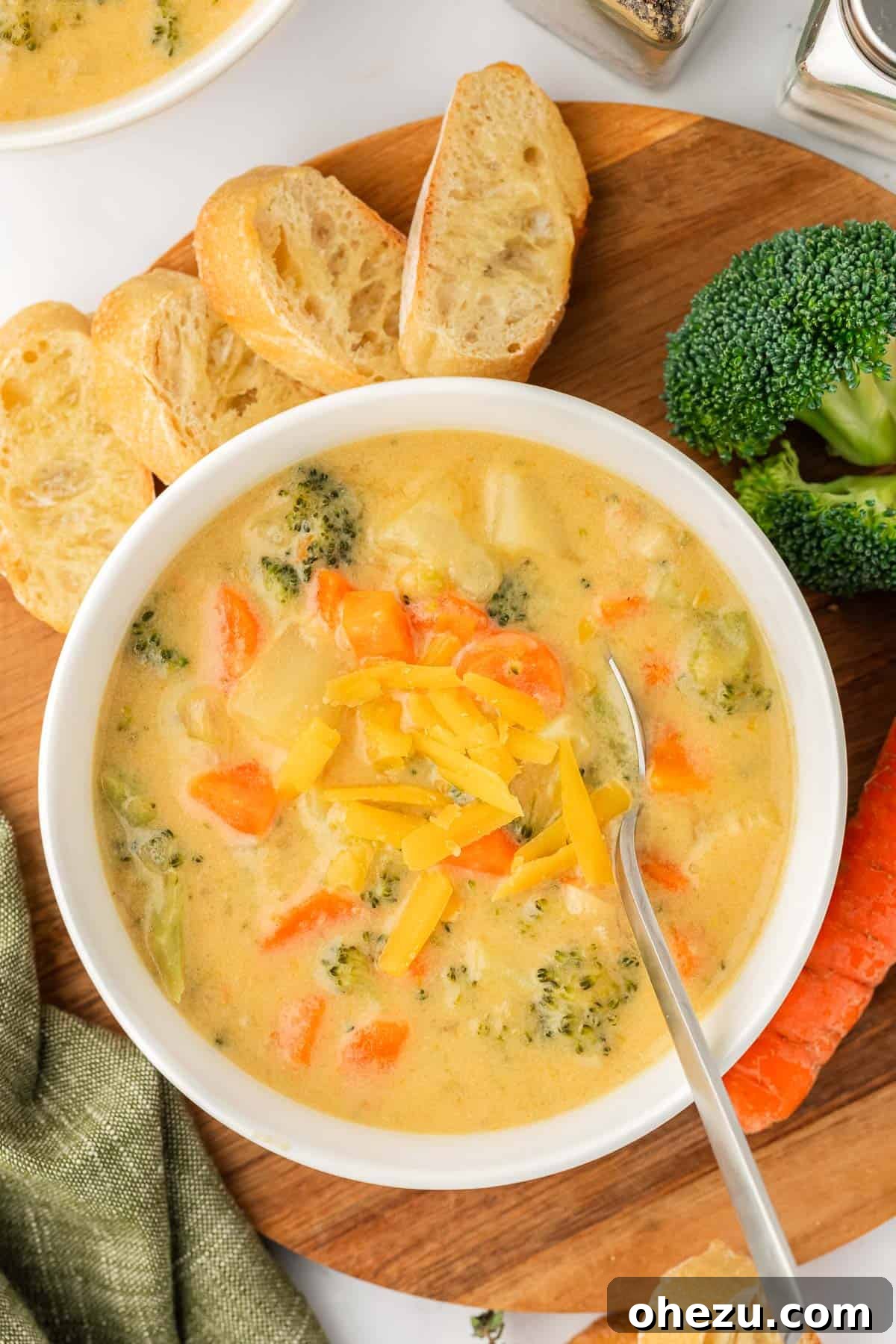 An inviting overhead shot of a bowl of creamy vegetable soup, perfectly presented and ready to be enjoyed, promising warmth and ultimate satisfaction.
