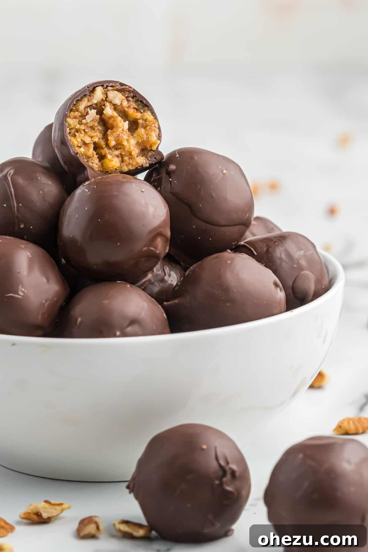 Pecan Pie Truffles 10 A rustic bowl filled with a generous amount of finished no bake pecan pie balls, ready to be served.