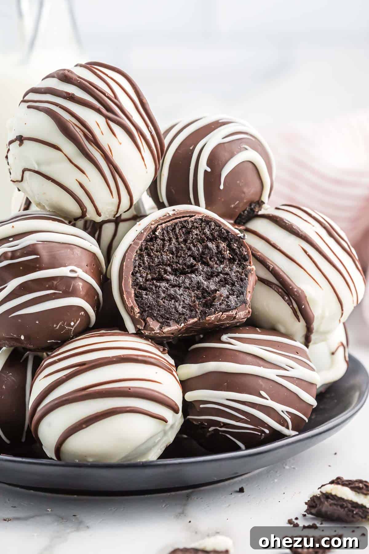 Delicious Oreo balls arranged beautifully on a serving plate, ready to be enjoyed.