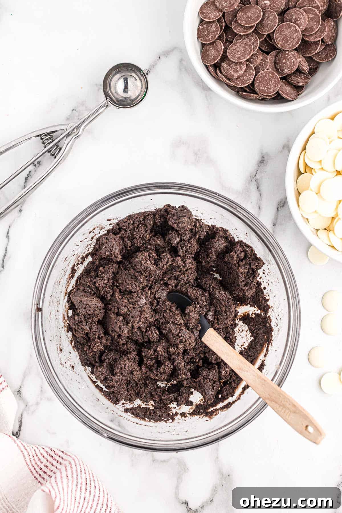 The smooth, dark oreo truffle filling in a bowl, showing its perfect consistency for rolling.