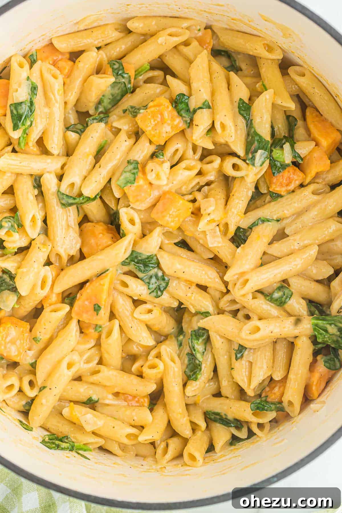 Velvet Sweet Potato Pasta 13 Another beautiful shot of the creamy sweet potato pasta with spinach, highlighting its appetizing appearance.