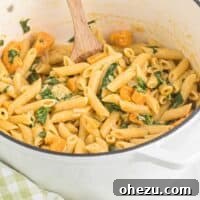 Velvet Sweet Potato Pasta 17 Sweet potato pasta in a Dutch oven with a round crop, representing the final dish.