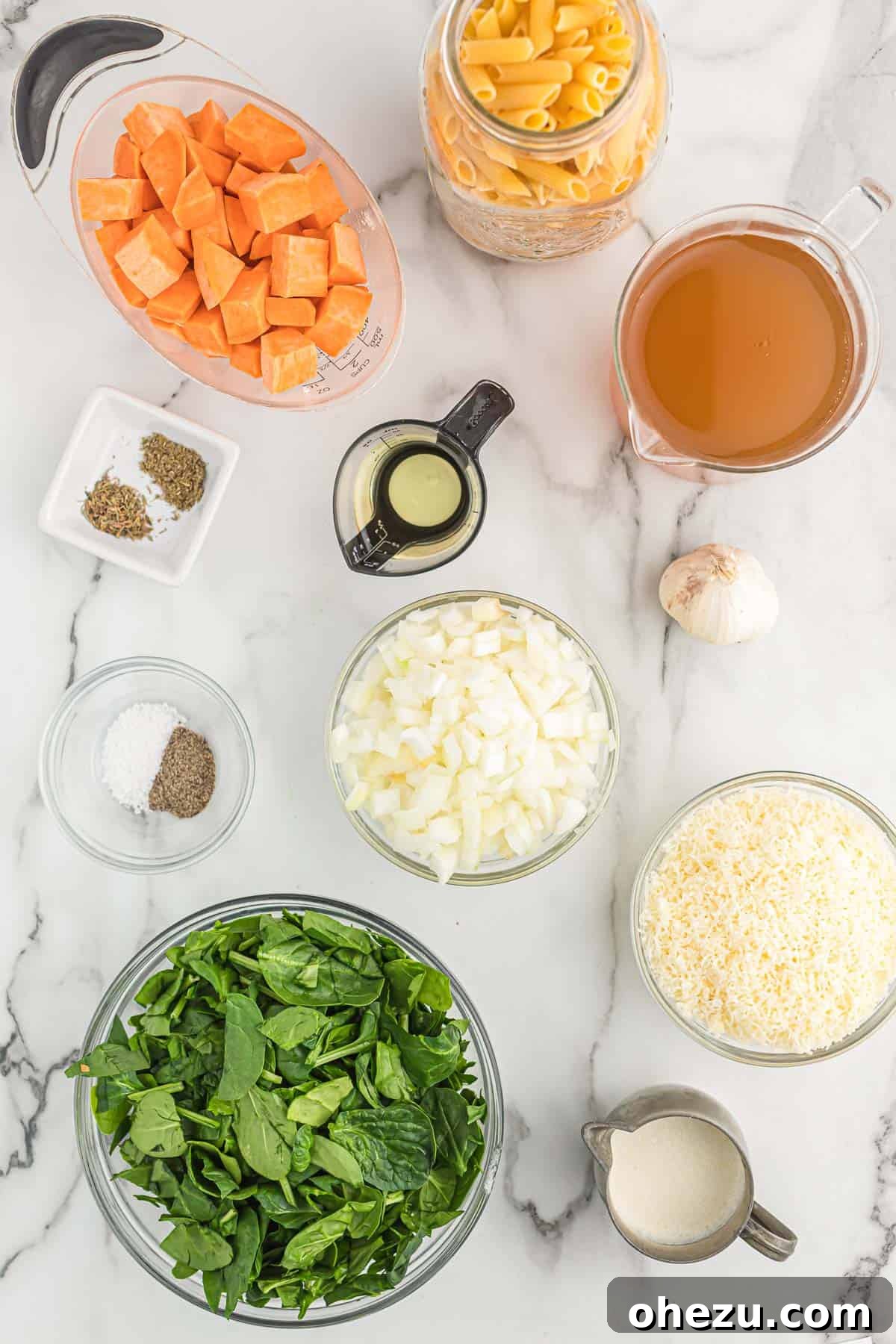 Velvet Sweet Potato Pasta 3 All fresh ingredients neatly laid out on a kitchen counter, showcasing everything needed to prepare the sweet potato pasta.