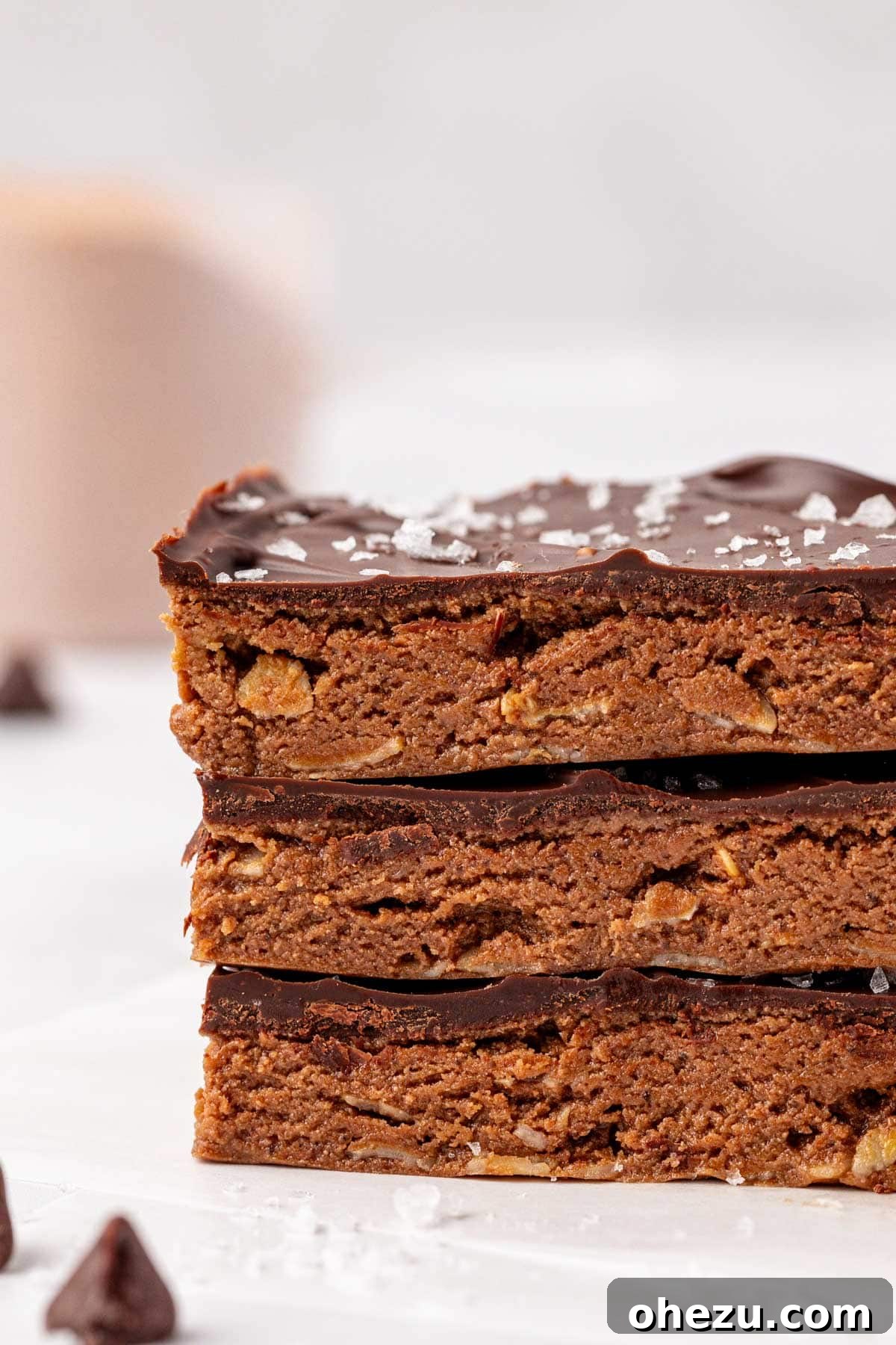 More perfectly cut chocolate protein bars, ready to be stored or served, highlighting their convenience.