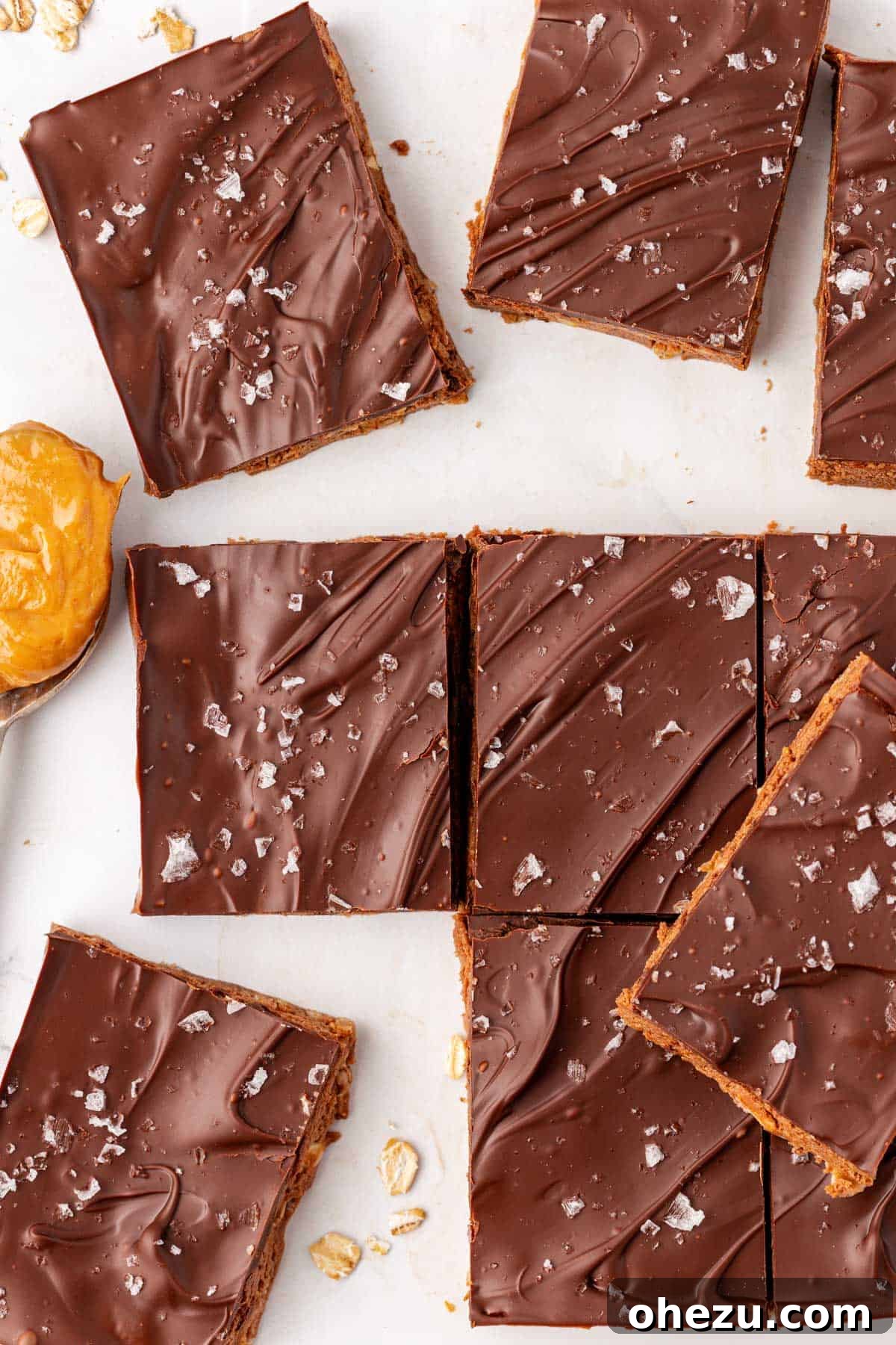 Close-up of a chocolate protein bar showing its rich texture and sea salt topping.