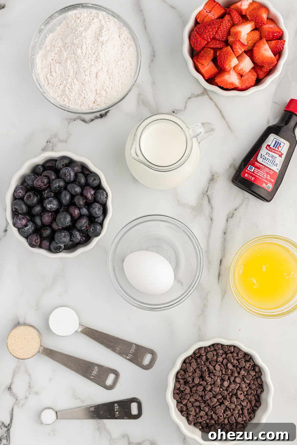 Baked Pancake Bites 4 All the fresh ingredients laid out on a kitchen counter, ready to be used for making mini pancake muffins