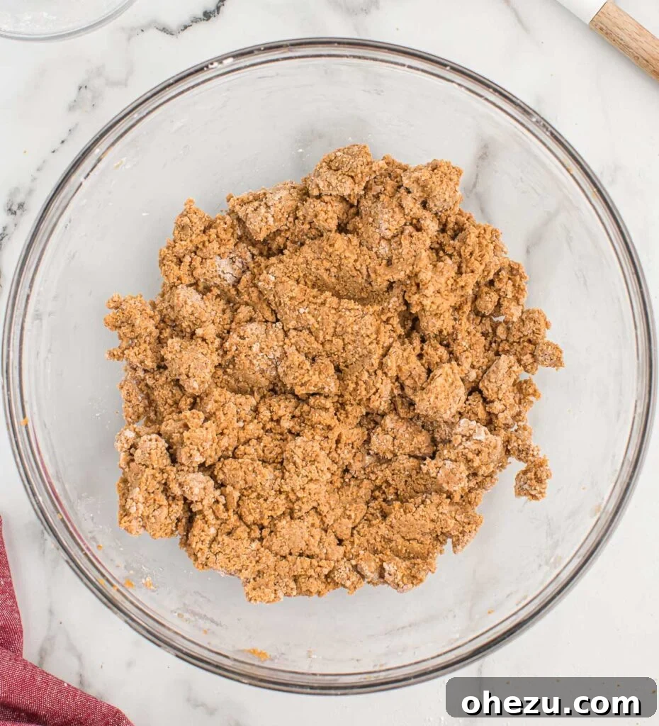 Fully mixed peanut butter ball dough, smooth and ready for shaping, in a mixing bowl