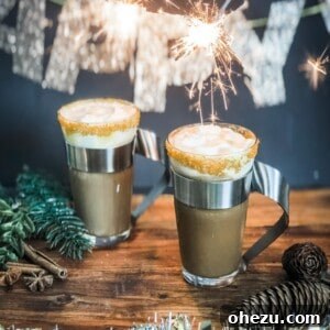 Garnished Holiday Moroccan Coffee (Alcoholic) in a clear mug, ready to be served.
