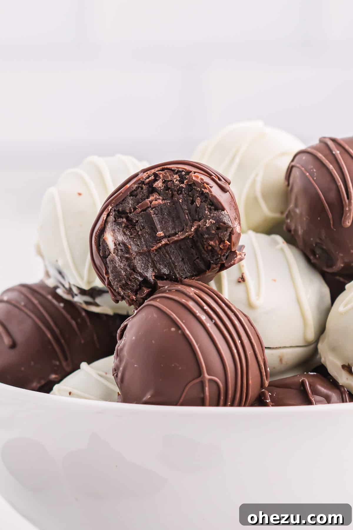 Emerald Oreo Delights 13 Another perspective of a dessert platter overflowing with various Mint Oreo truffles, showcasing their inviting presentation.