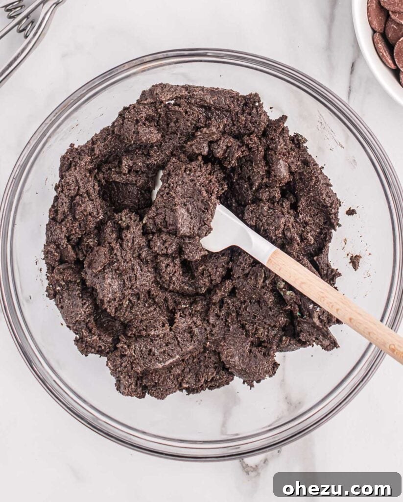 Emerald Oreo Delights 6 Oreo crumbs thoroughly mixed with softened cream cheese, forming a thick, uniform truffle dough.