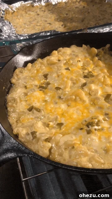 Smoky BBQ Brisket Sliders with Spicy Jalapeno Mac and Cheese 5 Short video of BBQ Brisket sizzling fresh out of the oven