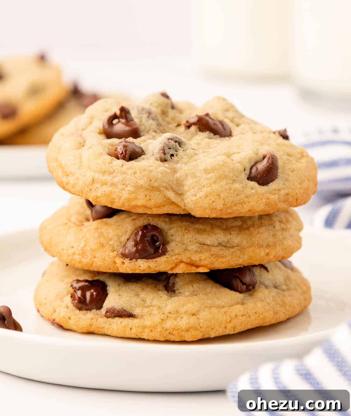 Perfect Chocolate Chip Cookies With No Brown Sugar 19 Three perfectly golden chocolate chip cookies without brown sugar, neatly stacked for serving