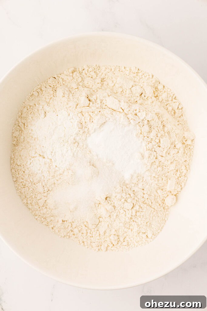 Perfect Chocolate Chip Cookies With No Brown Sugar 5 Close-up of a bowl containing flour, baking soda, salt, and cornstarch before mixing