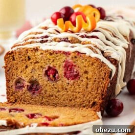 Featured image of White Chocolate Glazed Cranberry Eggnog Bread.