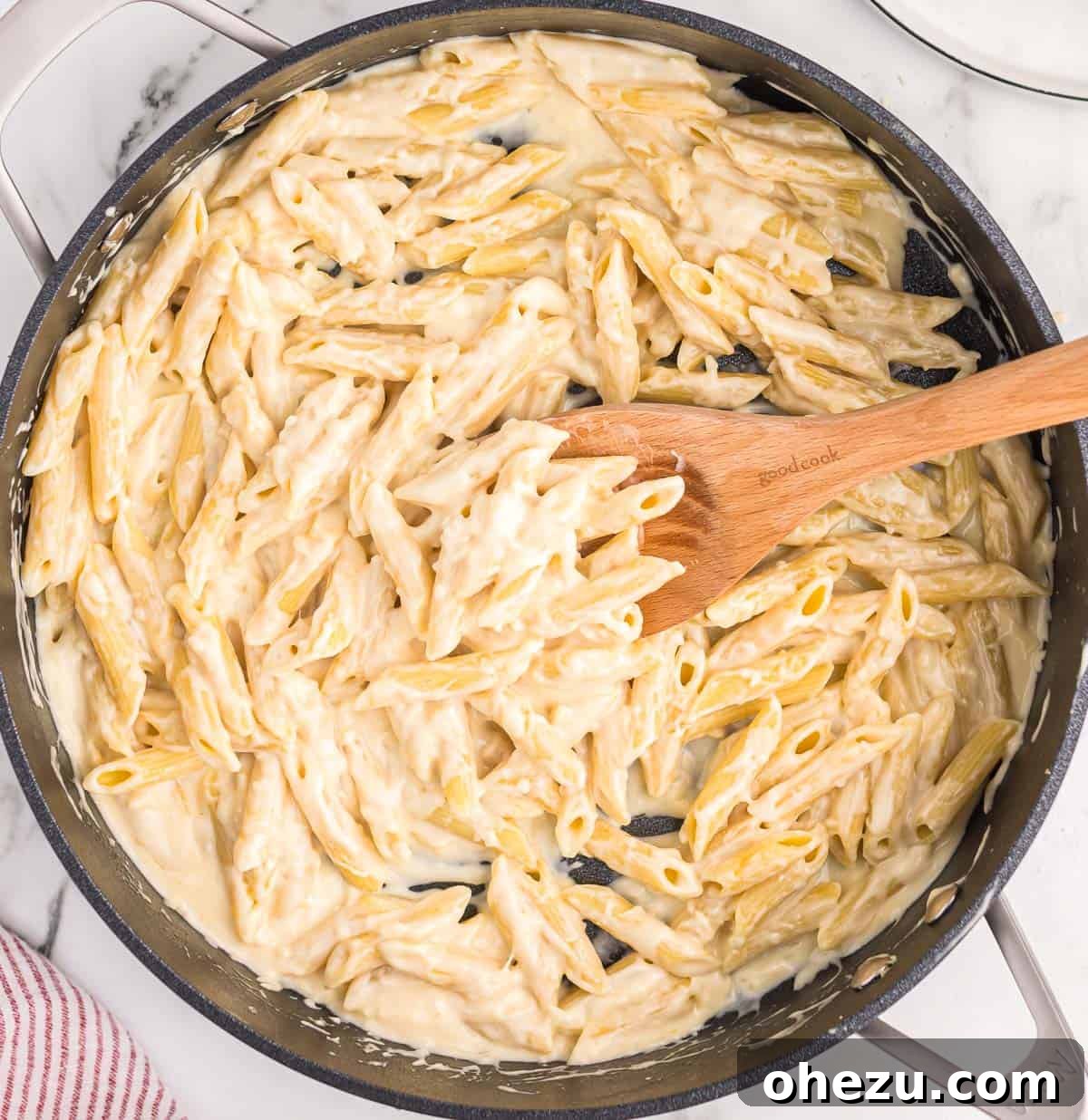 creamy penne pasta in a skillet