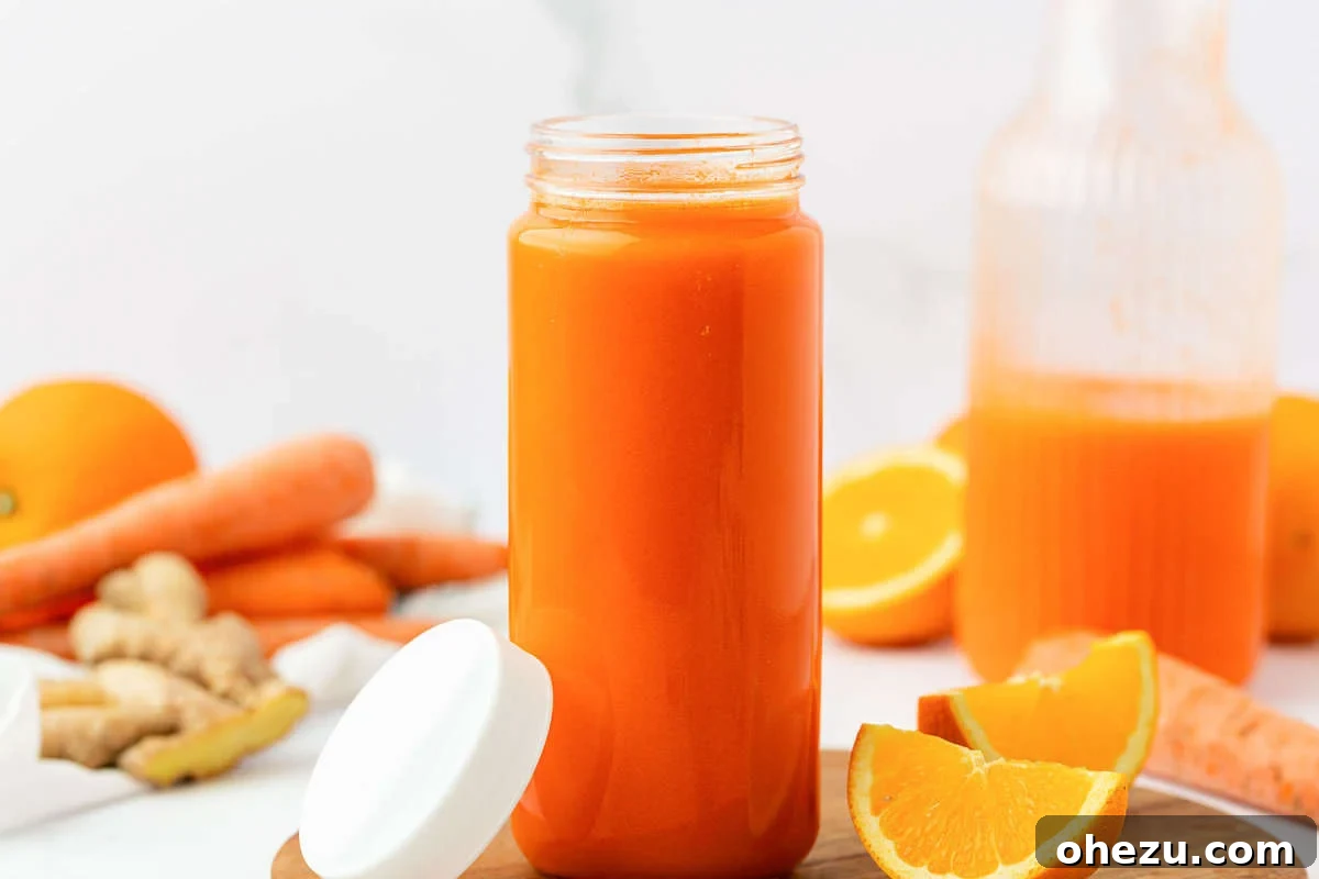 A glass bottle of homemade carrot juice with a sealed lid, indicating proper storage for refrigeration