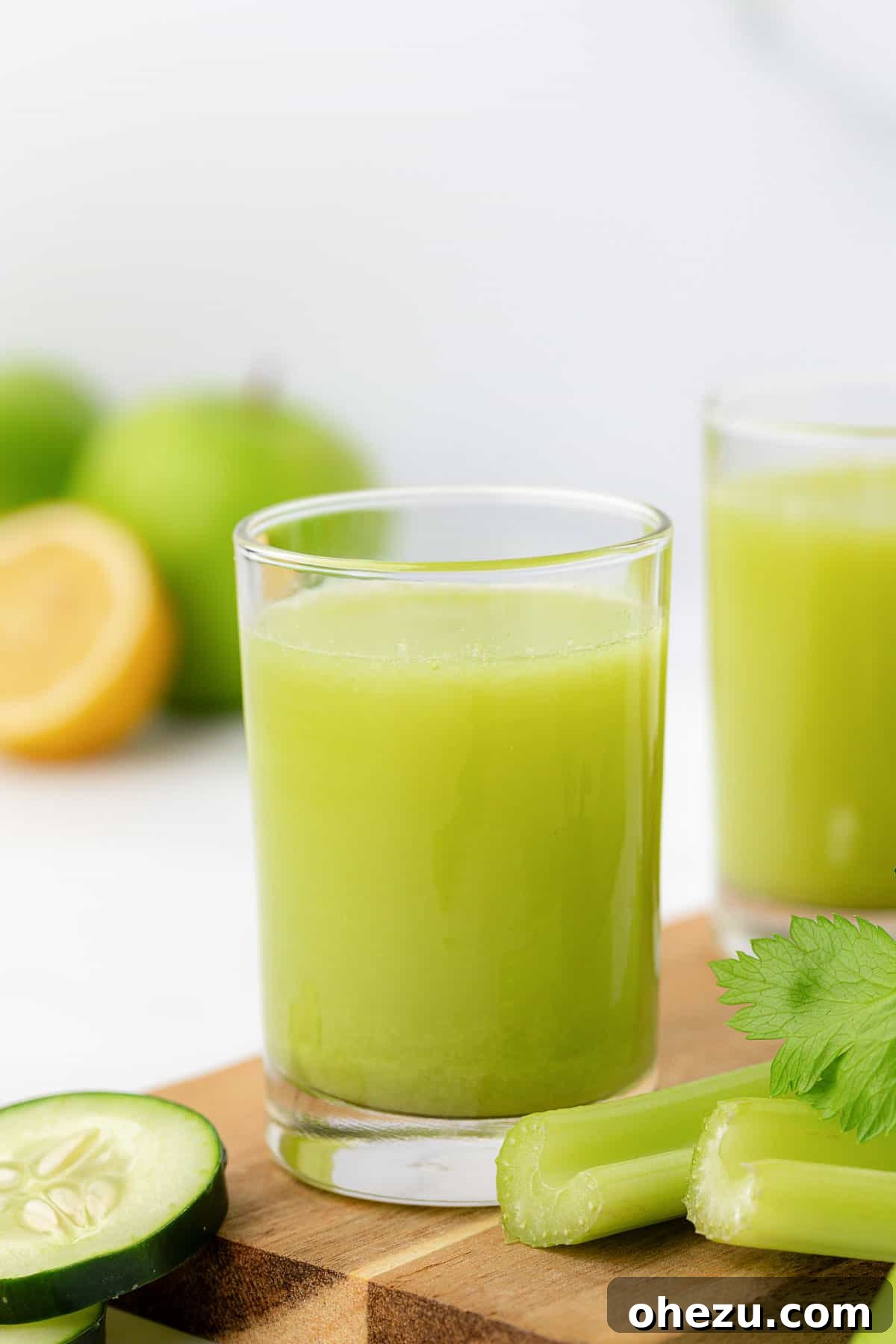 celery juice in a glass, ready to drink