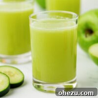 Green apple juice in a glass