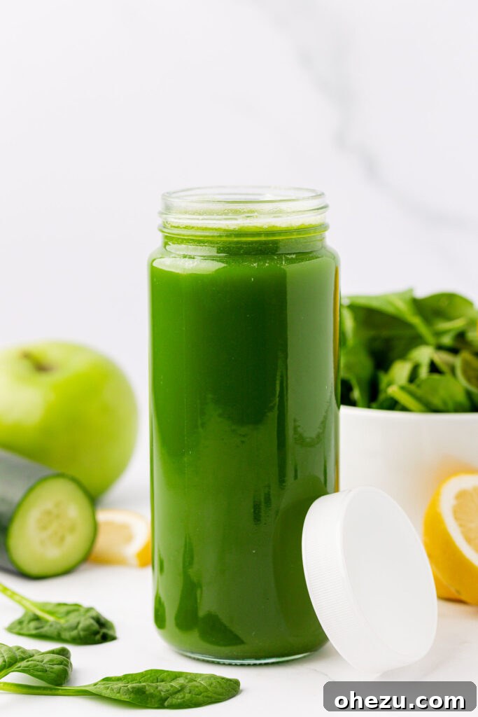 Green Vitality Boost 9 Two glass jars filled with spinach juice, securely lidded and ready for refrigeration.