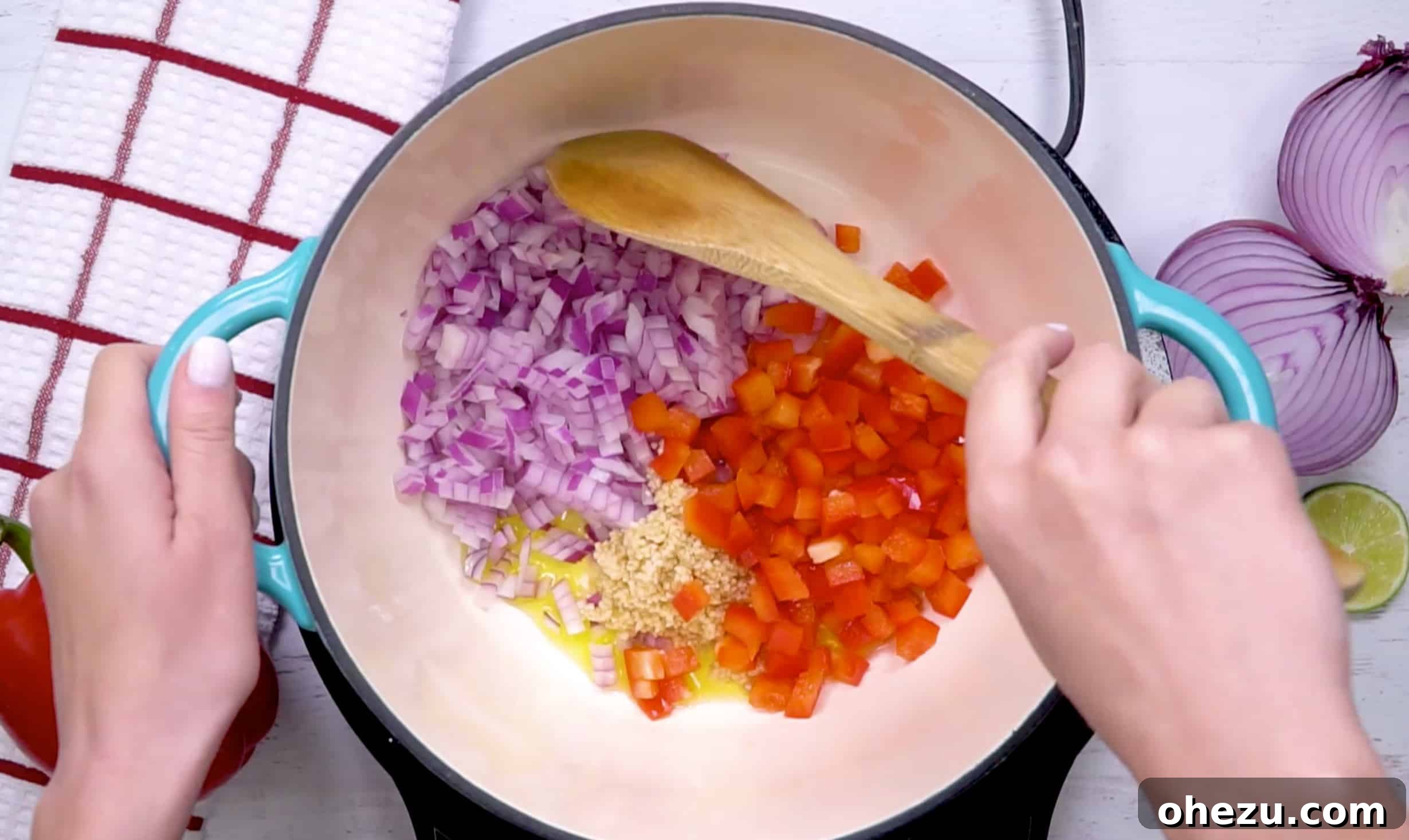 Fiesta Vegetarian Bake 9 Frozen corn and diced fire-roasted tomatoes being added to sautéed vegetables
