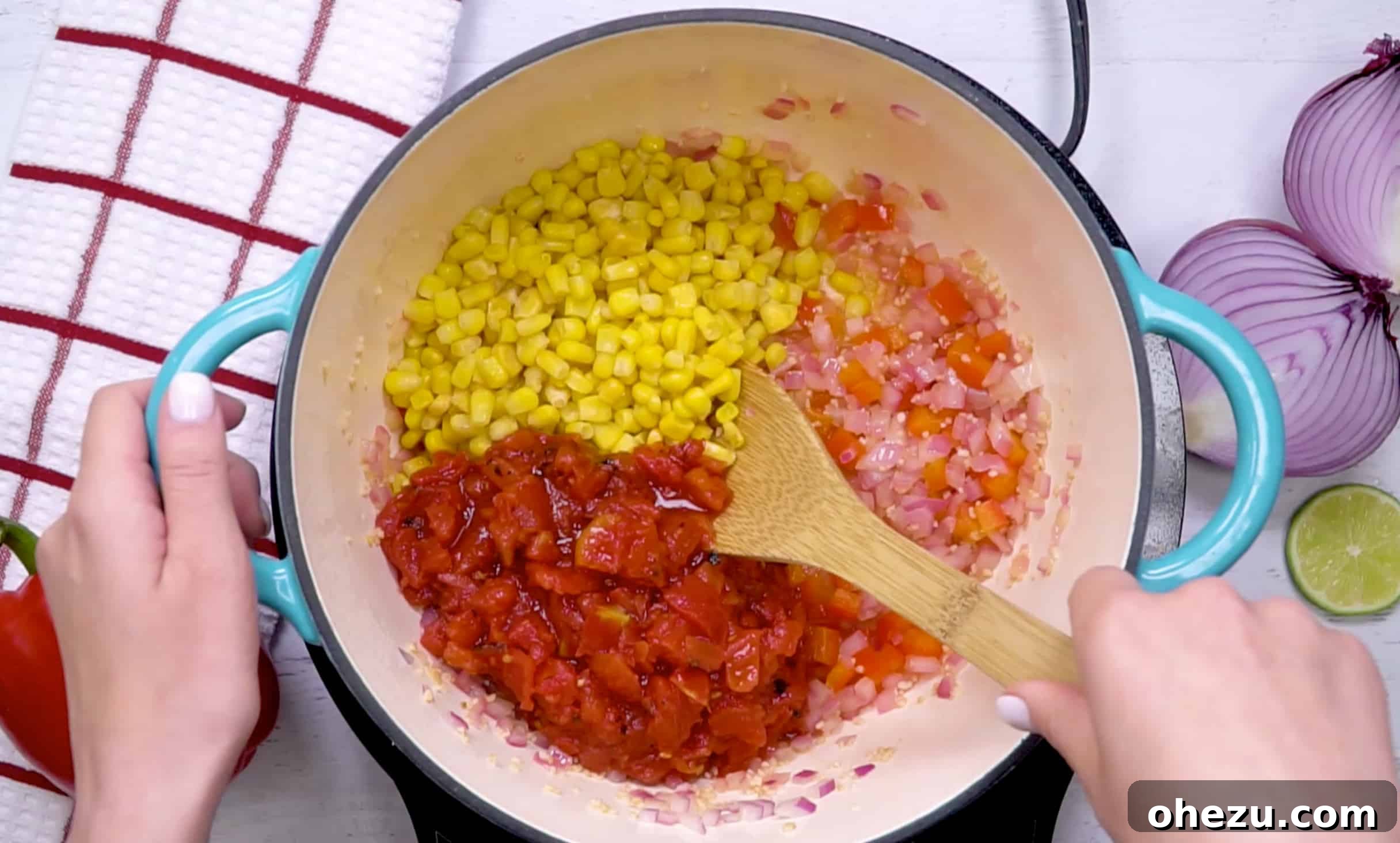 Fiesta Vegetarian Bake 10 Fire-roasted tomatoes and corn mixed with other vegetables in the pan