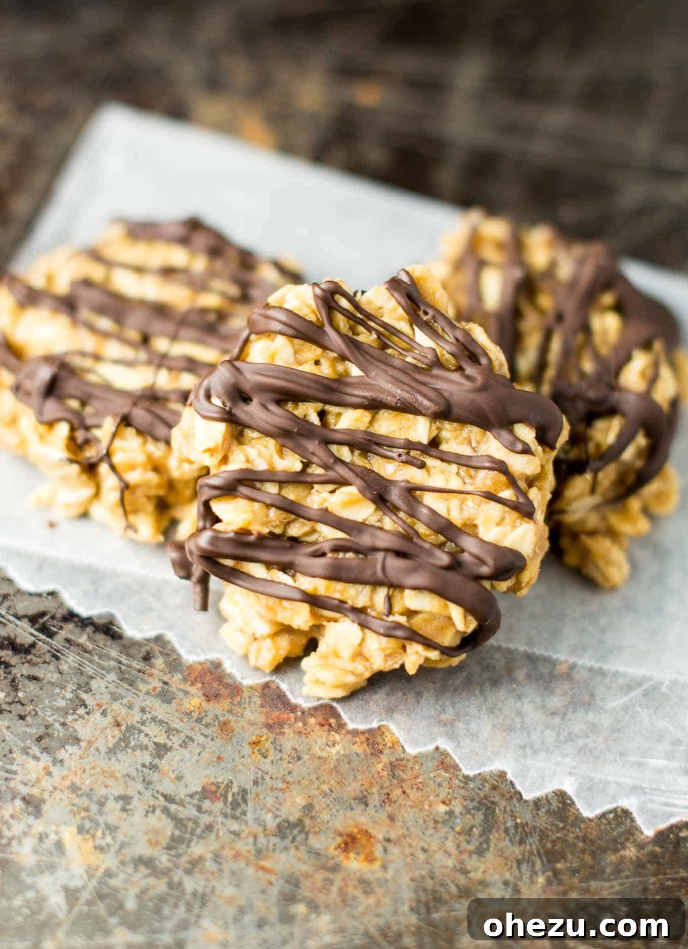 Wholesome Peanut Butter No-Bake Treats 3 A beautiful stack of healthy peanut butter no bake cookies, artfully drizzled with melted chocolate