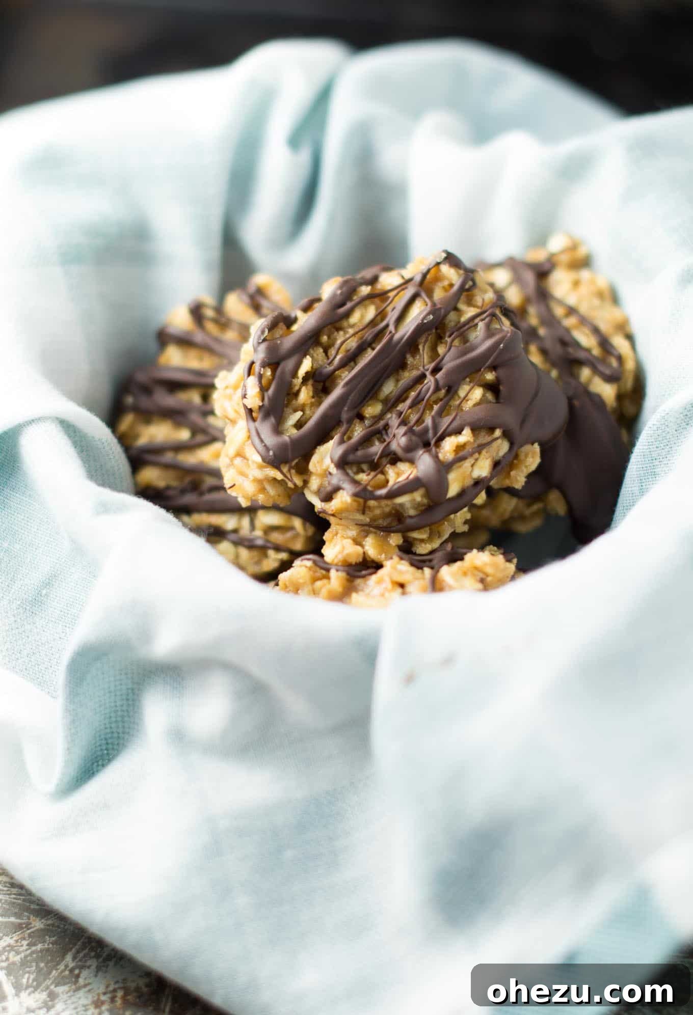 Wholesome Peanut Butter No-Bake Treats 5 A vibrant platter showcasing a variety of healthy peanut butter no bake cookies, each with a unique chocolate drizzle pattern