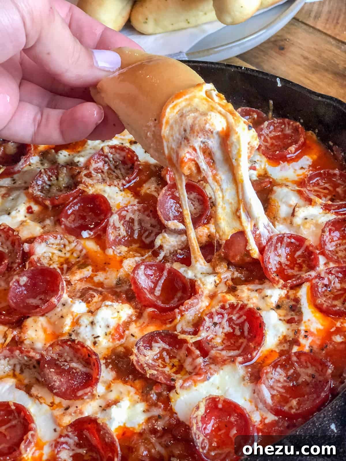 Loaded Meat Pizza Dip 3 Close-up of Gooey Cheese and Pepperoni in Meat Lover's Pizza Dip