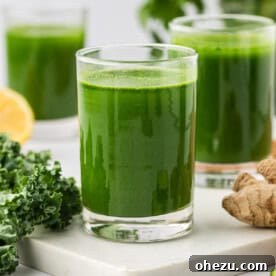 A glass of vibrant vegetable juice ready to be served