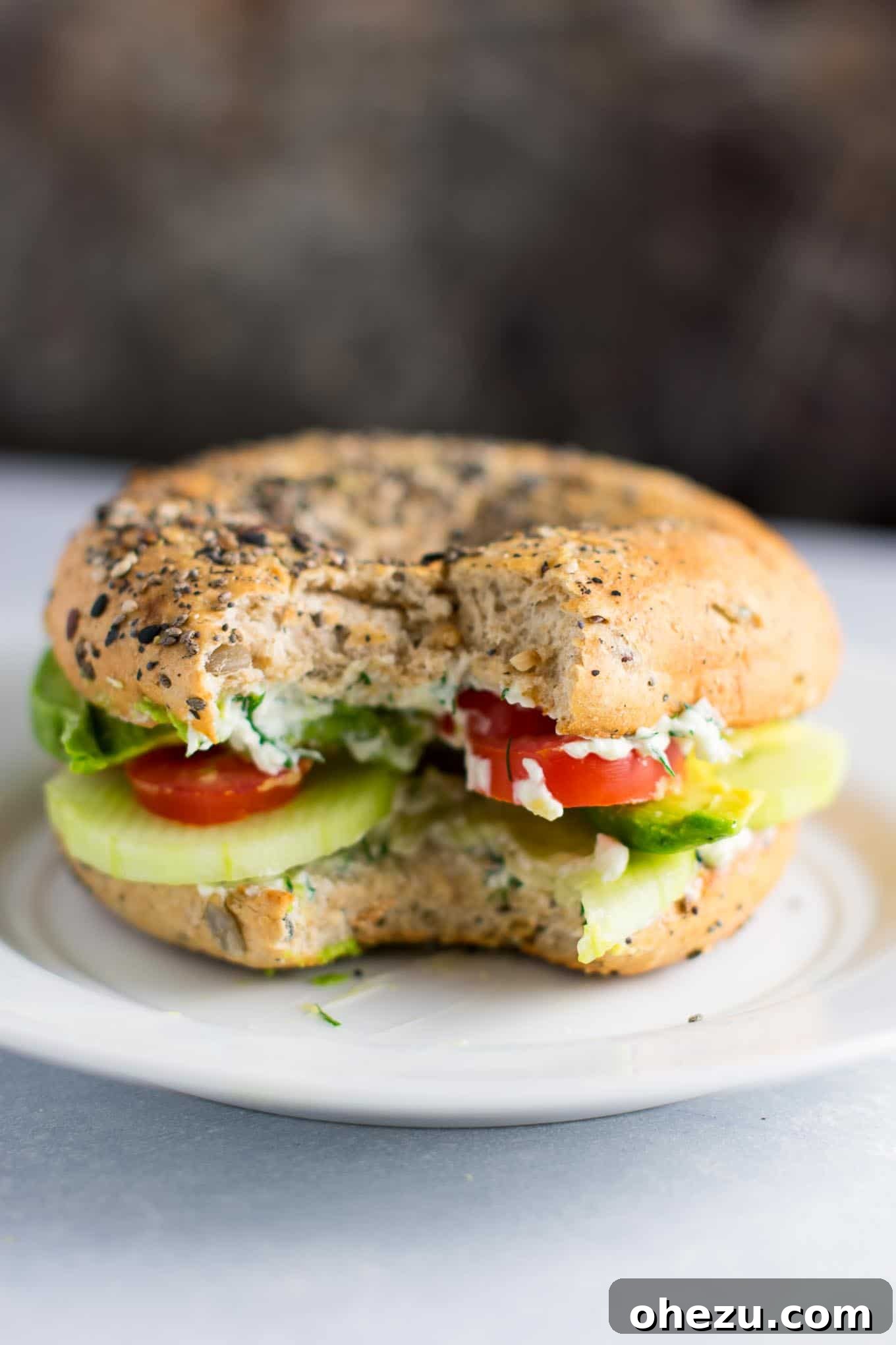 Everything-Spiced Veggie Delights with Garlic Dill Cream Cheese 3 Close-up of Everything Bagel Veggie Sandwich showcasing fresh ingredients and garlic dill cream cheese