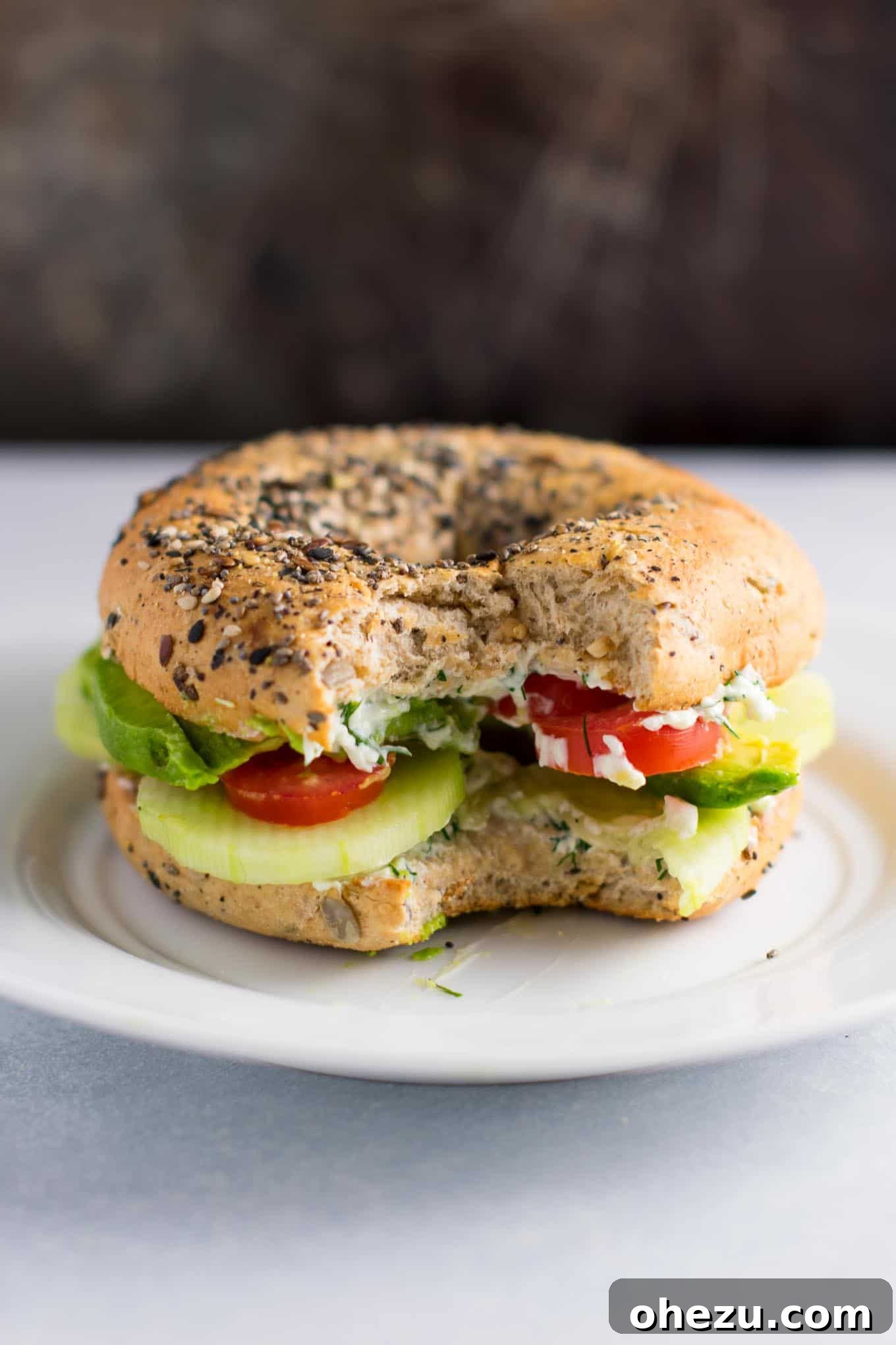 Everything-Spiced Veggie Delights with Garlic Dill Cream Cheese 6 Everything Bagel Veggie Sandwiches layered with cucumber, tomatoes, and avocado