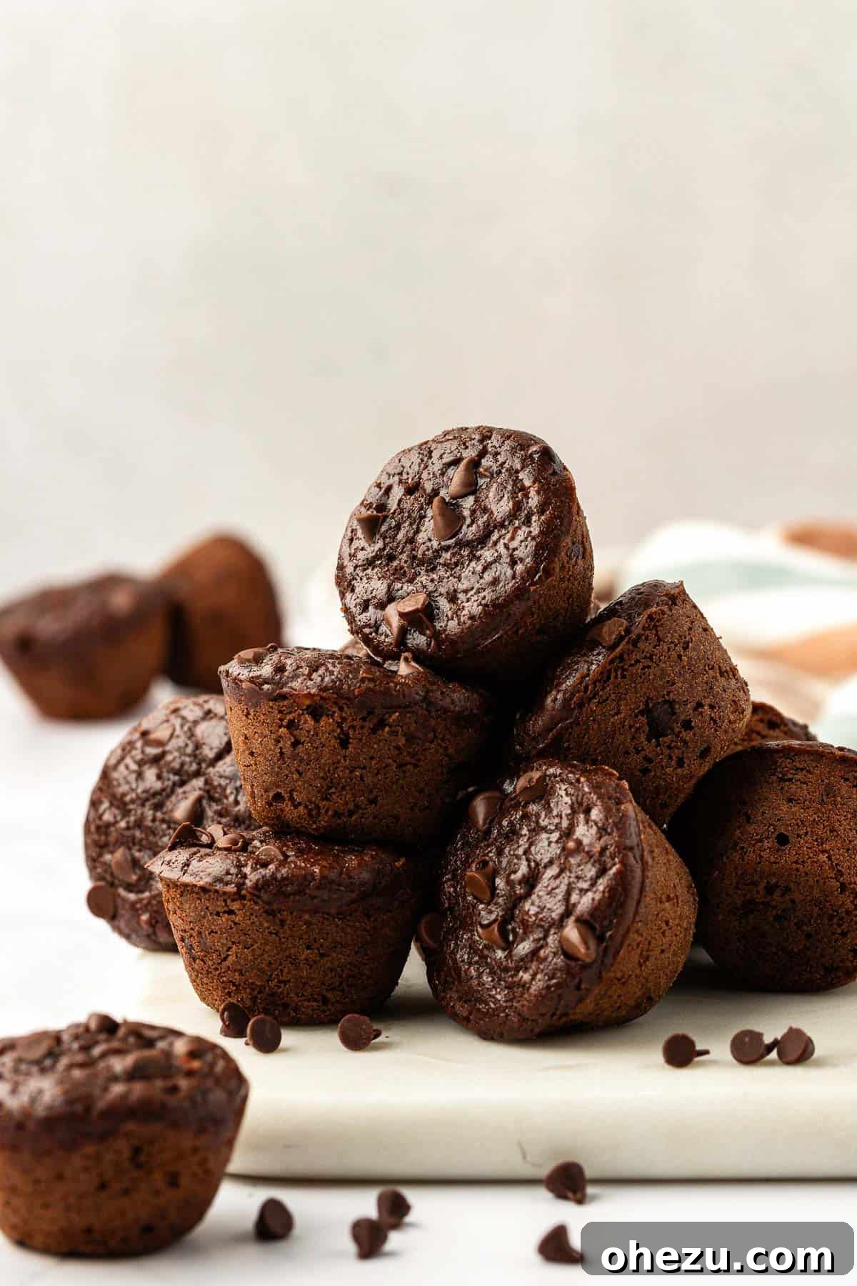 Nourishing Chocolate Mufflets 17 Artistically arranged healthy chocolate mini muffins, highlighting their perfect texture and delicious appearance