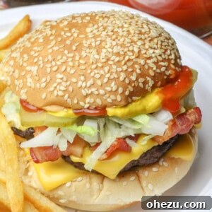 The Ultimate Homemade Travis Scott McDonalds Burger 8 The Travis Scott Burger McDonald's Copycat Recipe, a vibrant image of the finished burger with fries.