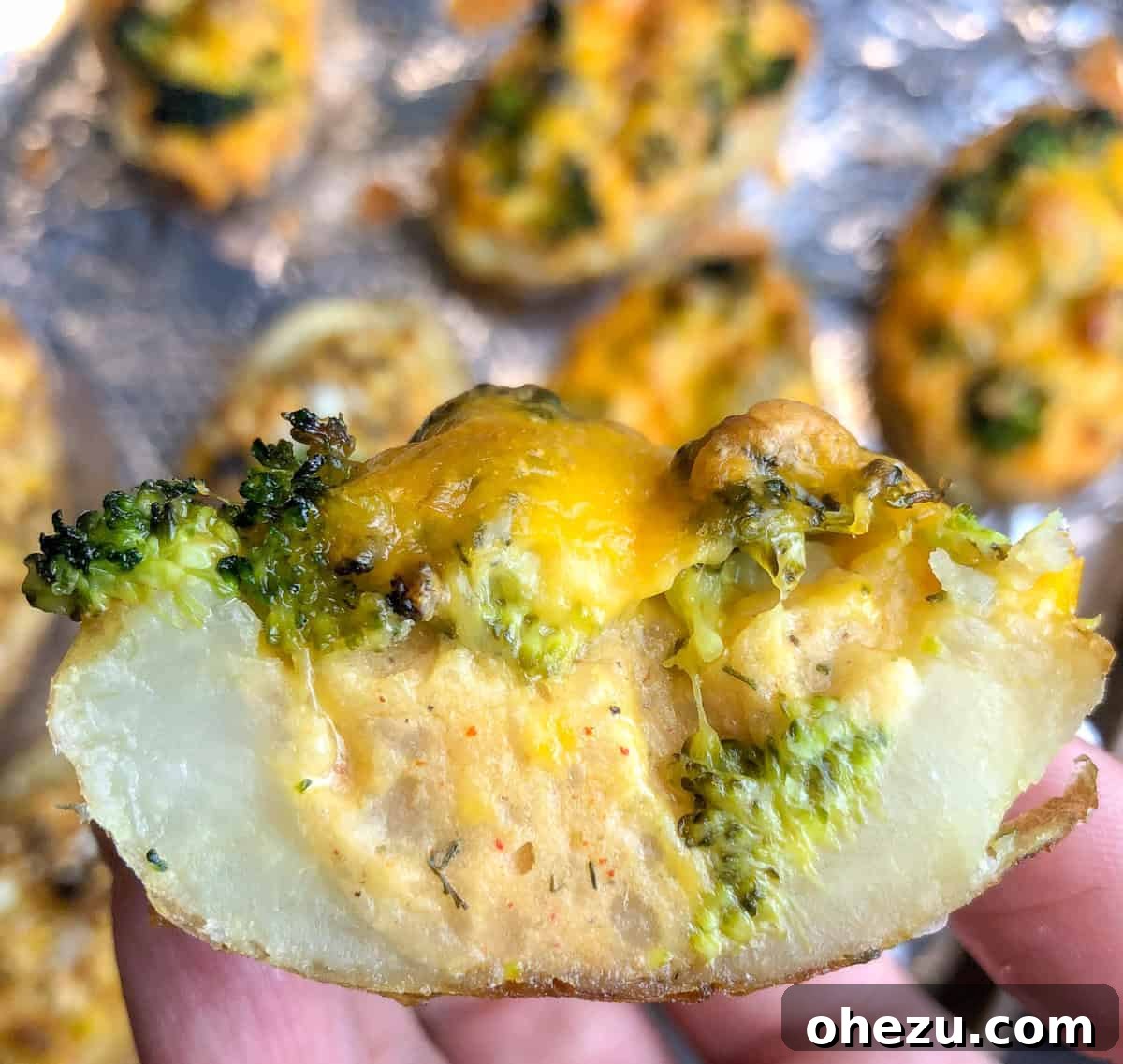 Irresistible Broccoli Cheddar Twice Baked Potatoes 9 Lush, creamy filling of broccoli, cheddar, and herbs ready to be scooped into potato skins