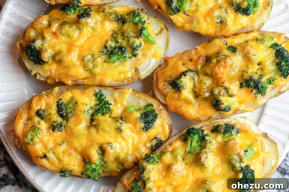 Irresistible Broccoli Cheddar Twice Baked Potatoes 10 Freshly baked russet potatoes, cut in half and ready for scooping