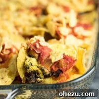 Easy Vegan Taco Bake Recipe - a quick and delicious plant-based dinner with black beans, salsa, tortilla chips, and nutritional yeast. Perfect for busy weeknights, ready in minutes!