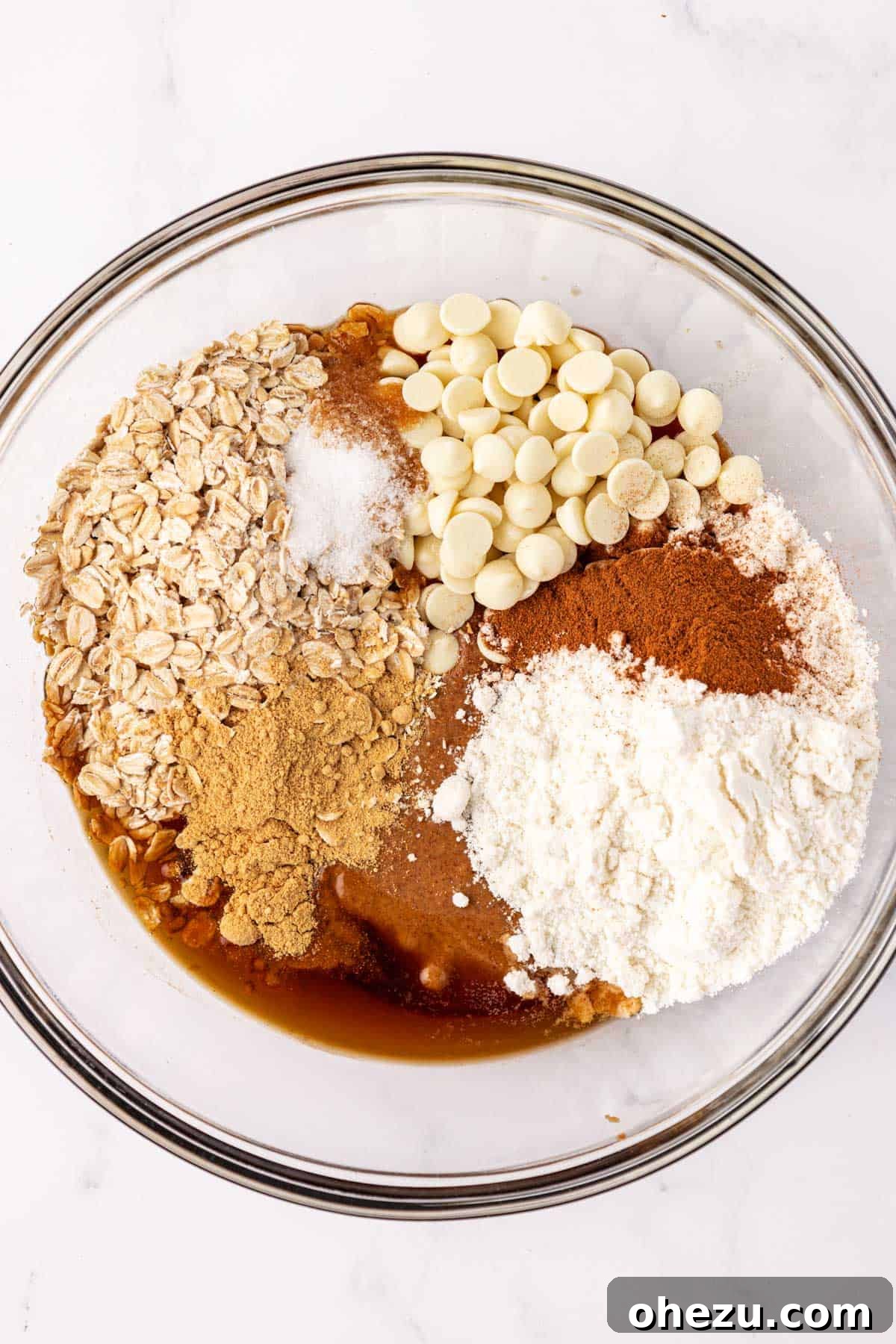 Festive Gingerbread Power Bites 5 All ingredients for energy bites in a mixing bowl before combining