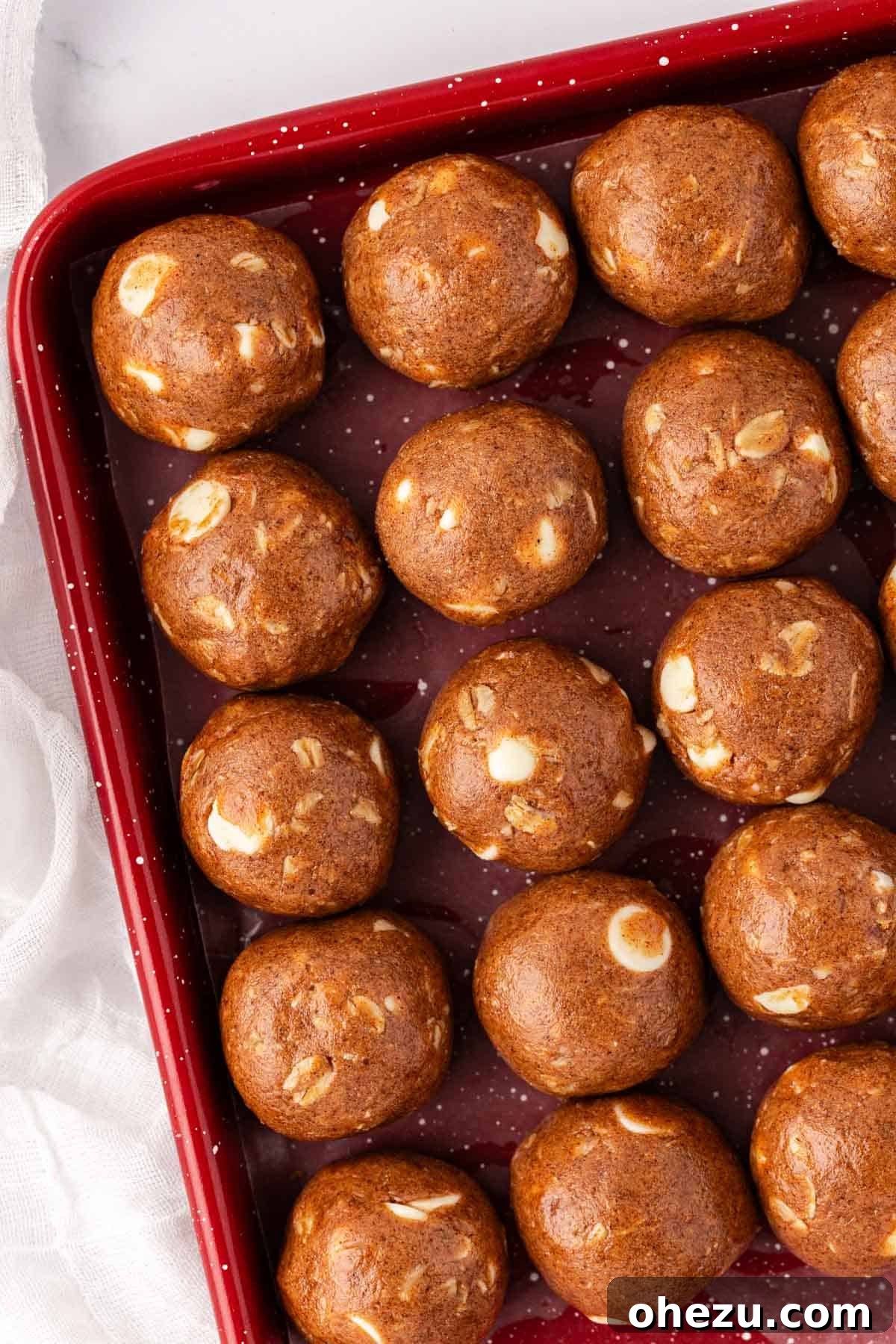 Festive Gingerbread Power Bites 7 A tray of freshly made gingerbread energy bites chilling in the refrigerator
