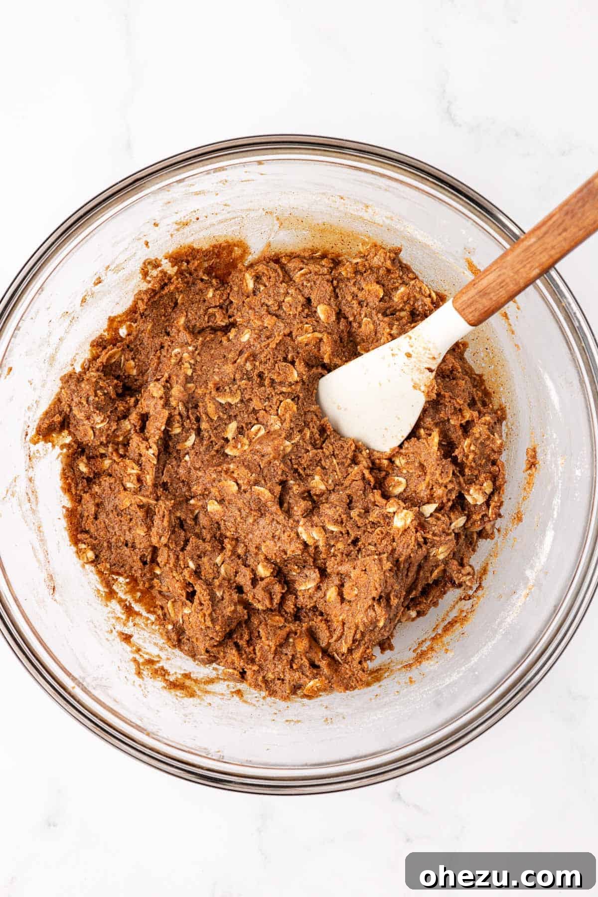 fully mixed energy bite batter in a glass bowl